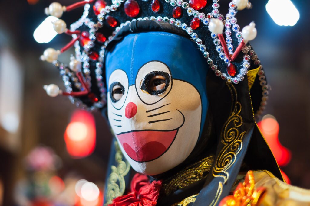 Chinese actor performs a traditional face-changing show