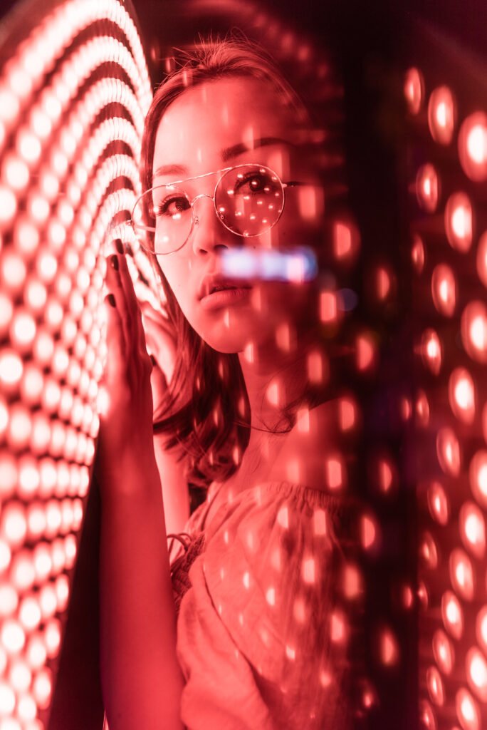 Young Chinese woman portrait with neon lights