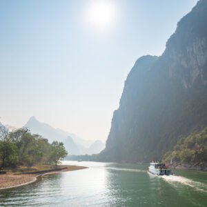 Li River cruise with limestone karst hills landscape in Yangshuo China