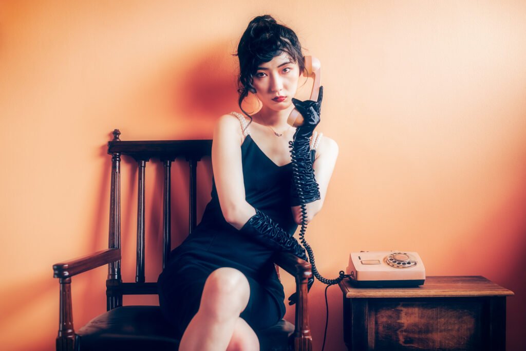 Young Chinese woman vintage studio portrait