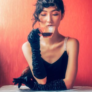 Young Chinese woman drinking coffee vintage portrait