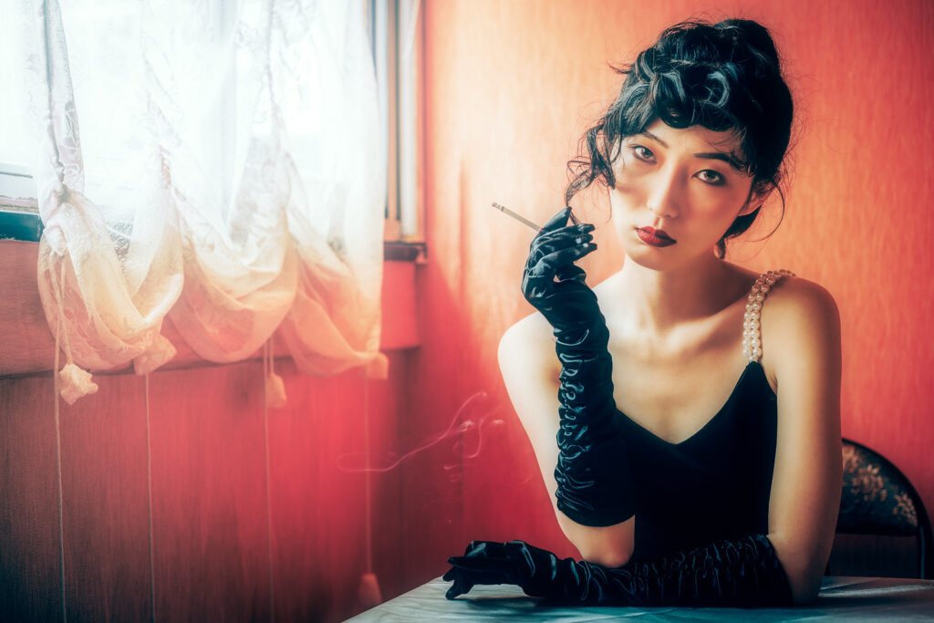Young Chinese woman smoking vintage portrait