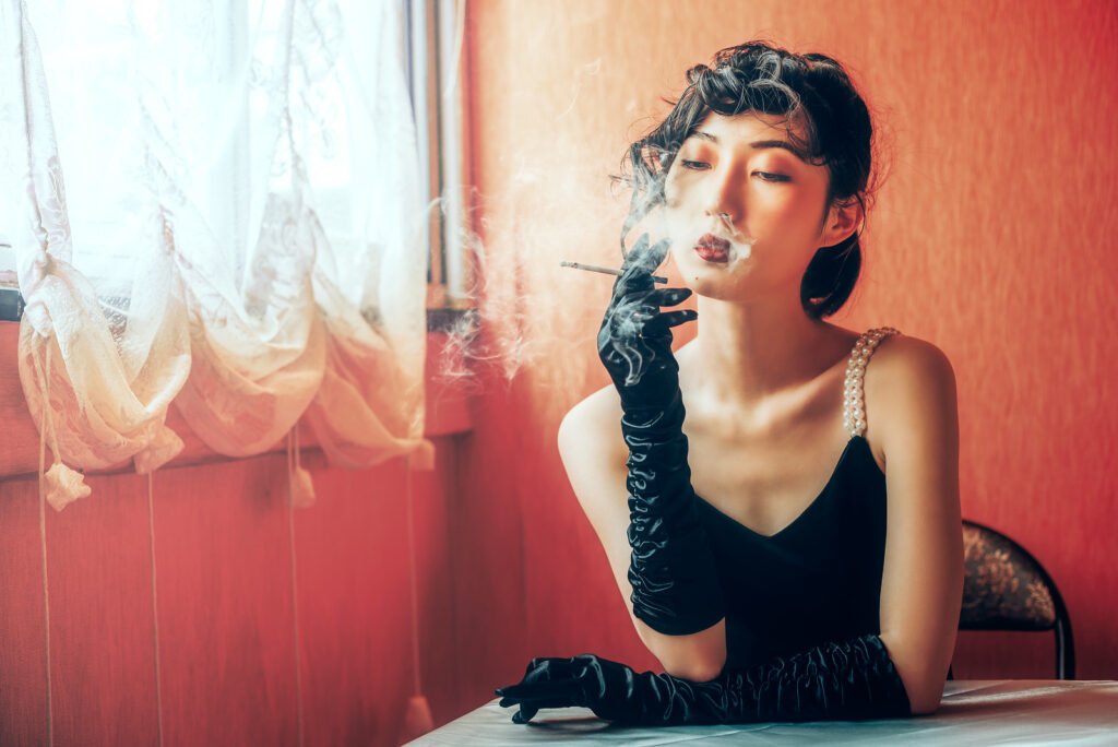 Young Chinese woman smoking vintage portrait