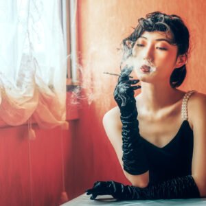 Young Chinese woman smoking vintage portrait