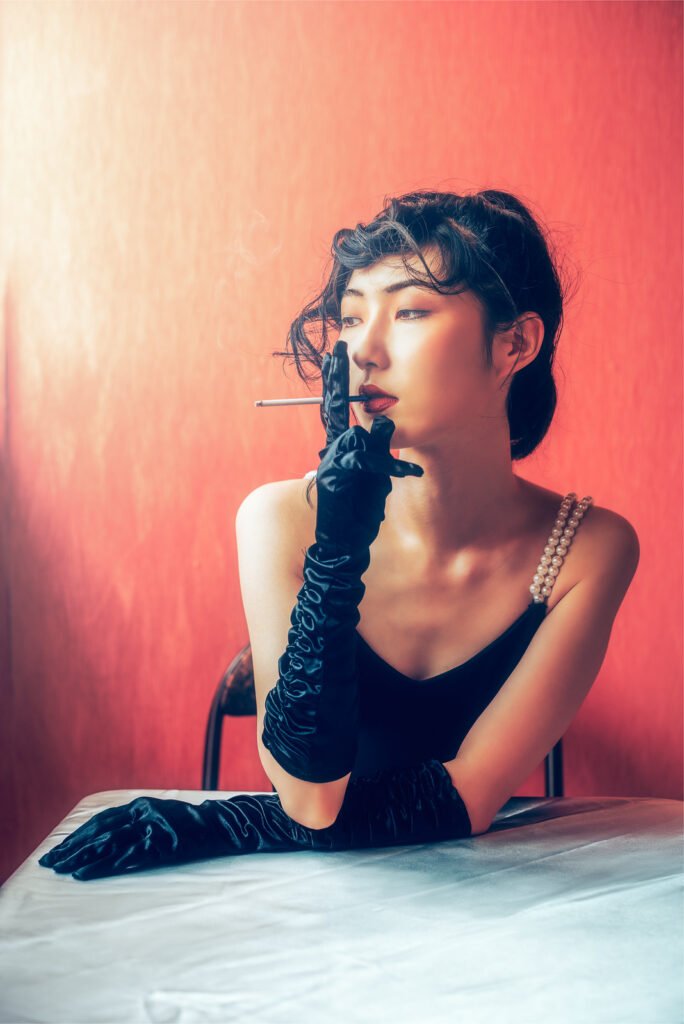 Young Chinese woman smoking vintage portrait