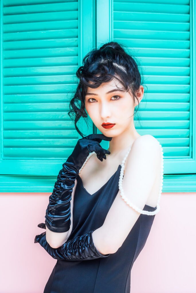 Young Chinese woman vintage studio portrait