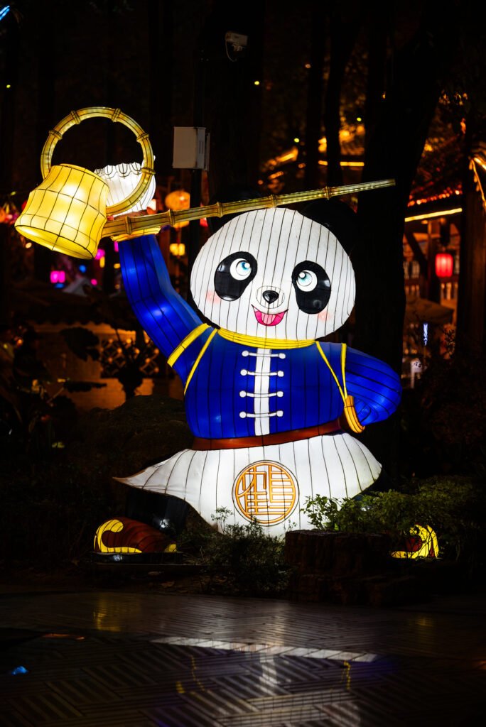 Panda lantern illuminated at night