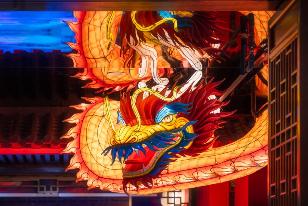 Dragon lanterns illuminated at night in Jinli ancient street