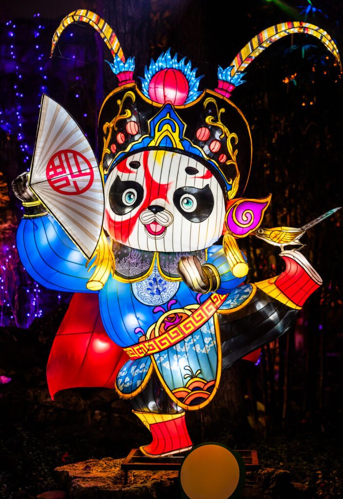 Panda lantern illuminated at night
