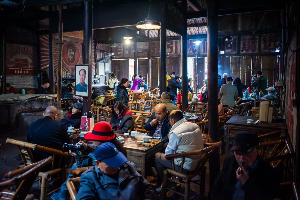 People sitting in a traditional Chinese tea house.