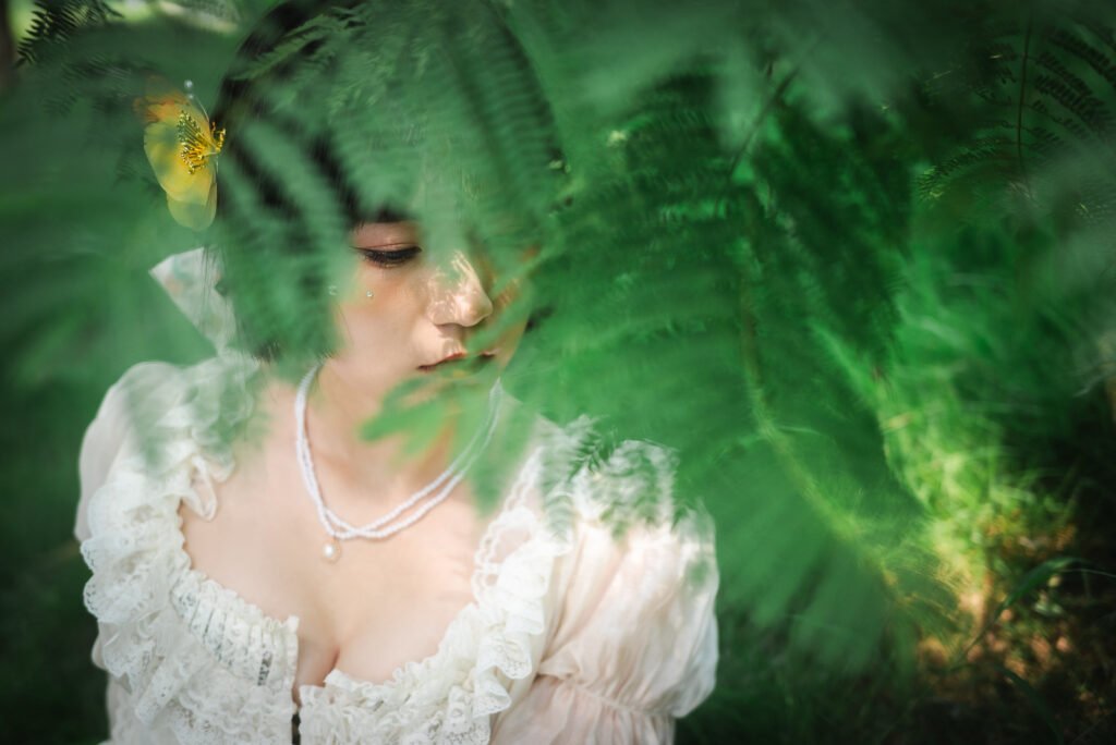A beautiful young woman in a white dress