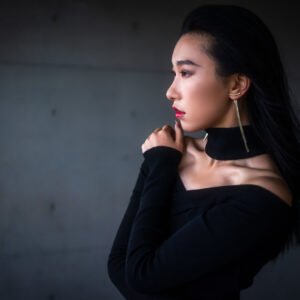 Young woman wearing a black dress portrait