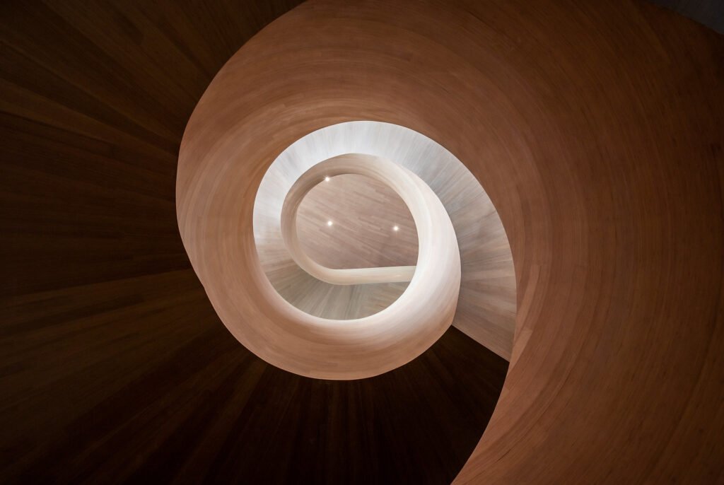 Spiral wooden staircase low angle view