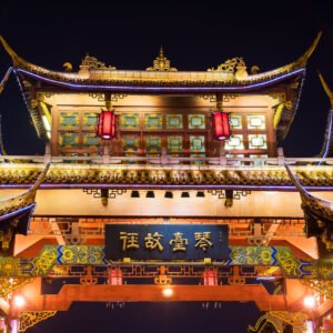 Qintailu chinese traditional gate illuminated at night closeup in Chengdu