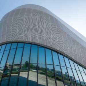 Futuristic architecture of modern building with blue reflective glass windows