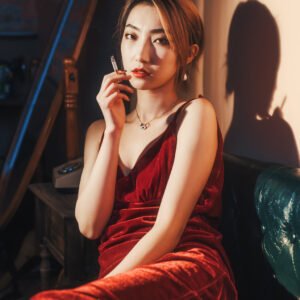 Lady in red dress smoking