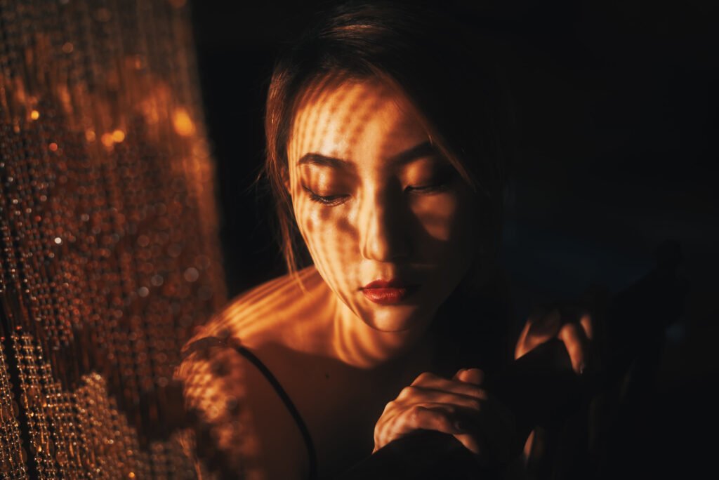 Mysterious woman with golden glimmer
