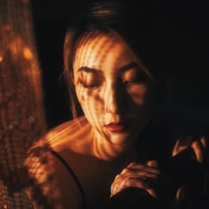 Mysterious woman with golden glimmer